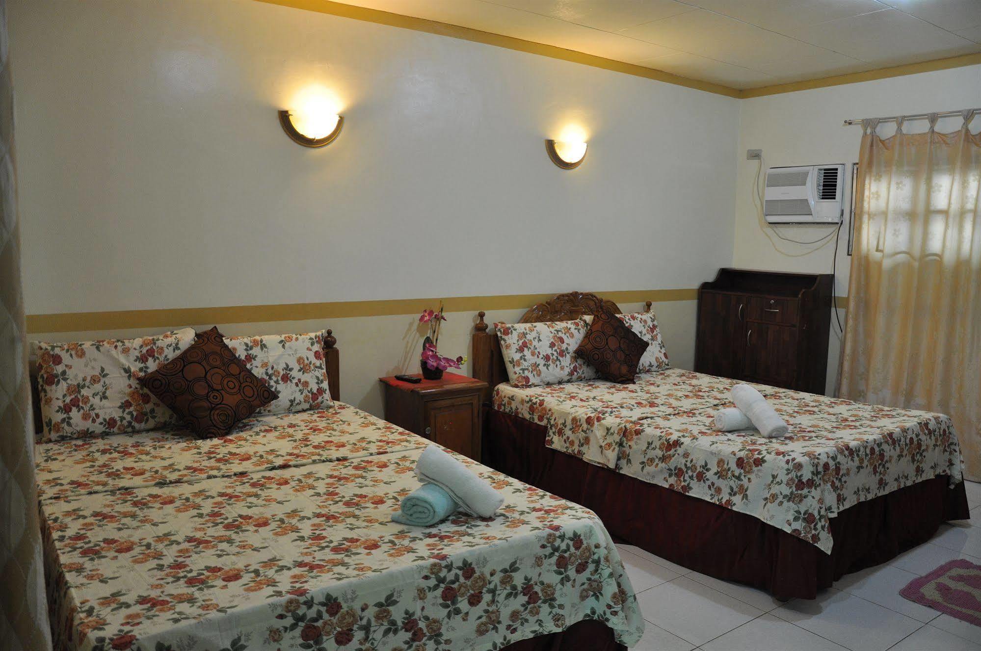 D'Lucky Garden Inn & Suites Tiniguiban Exterior photo